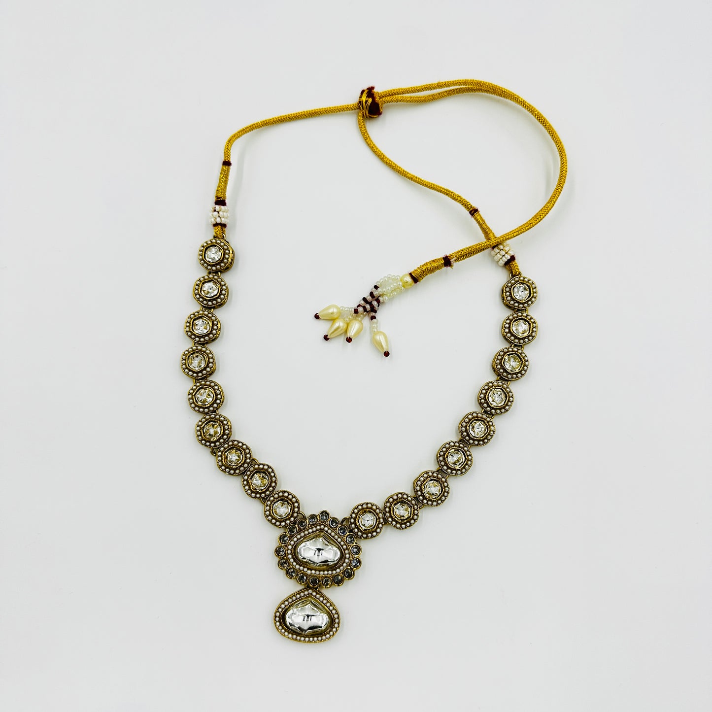 Antique Gold-Plated Kundan Necklace Set with White Stones & Maang Tikka