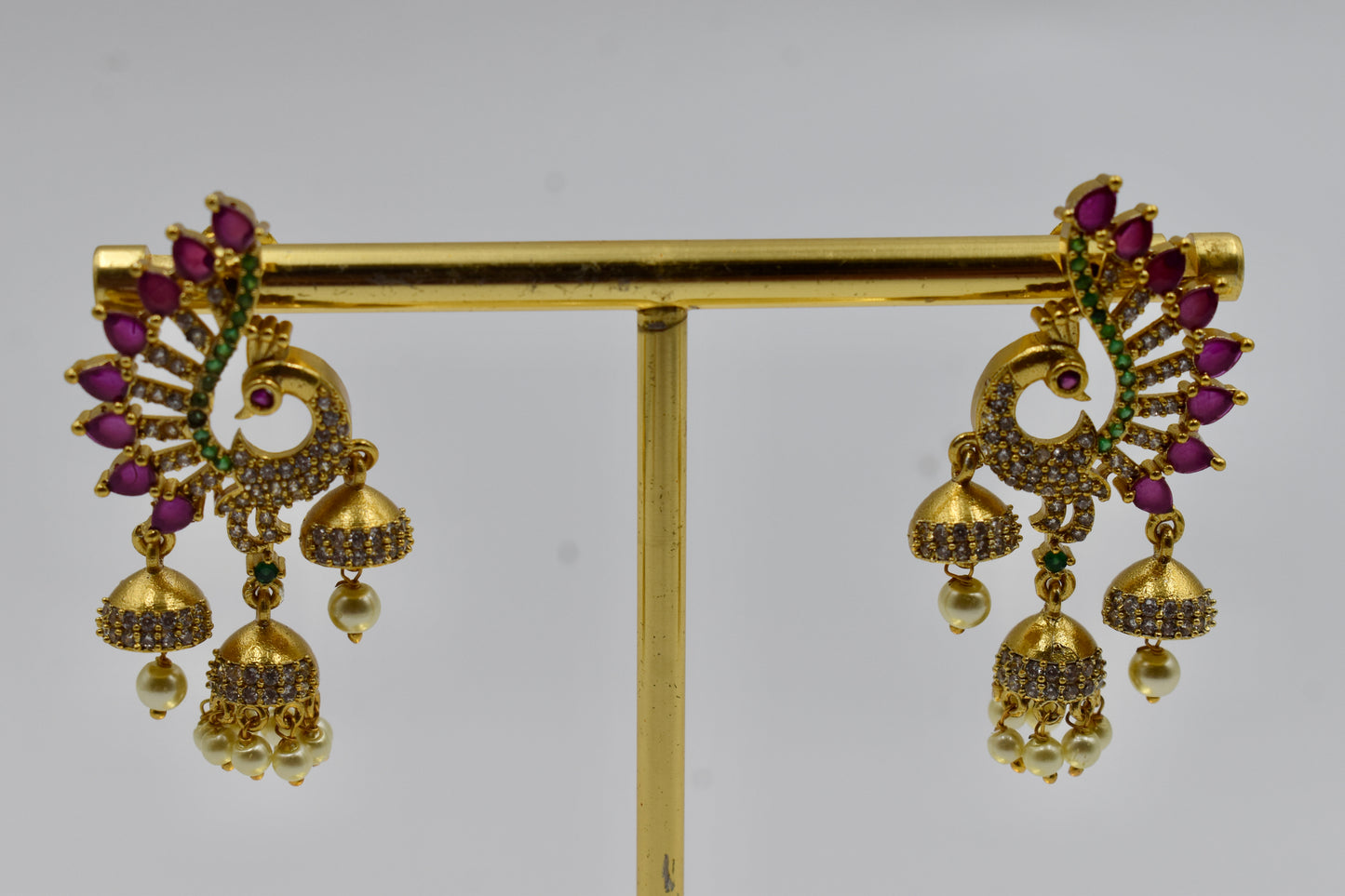 Gold-Plated Peacock Design Kundan Jhumka Earrings with Ruby & Pearl Drops