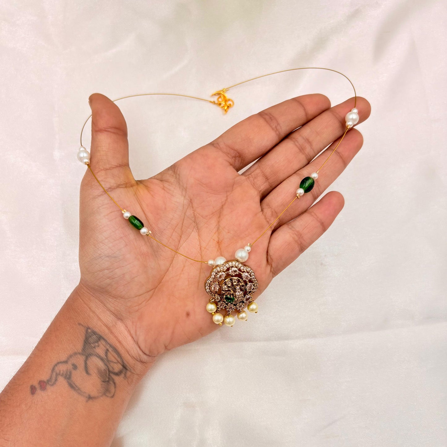 Gold Finish Temple Pendant Wire Necklace with Green Beads & Pearls