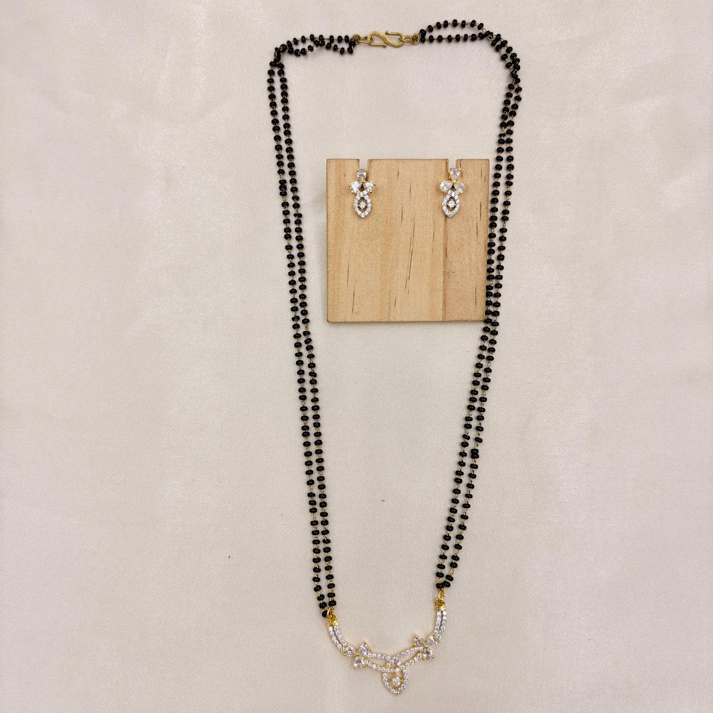 Gold Finish Double Line CZ Mangalsutra with Matching Earrings