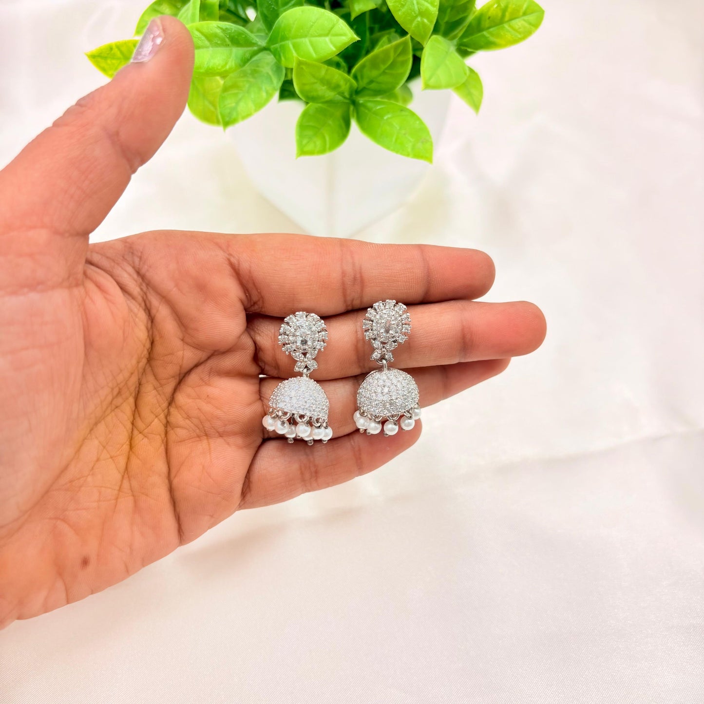 Silver Finish CZ Stud Jhumka Earrings with Pearl Drops
