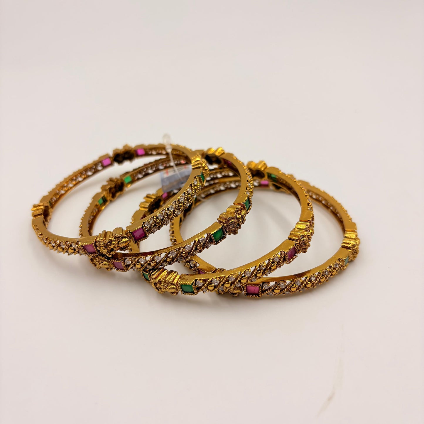 Gold-Plated Lakshmi Temple Bangles with Green & Ruby Stones – Bridal South Indian Design