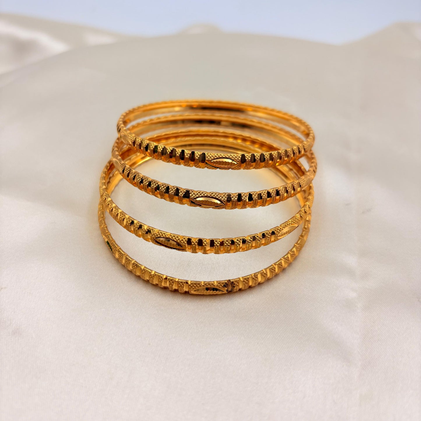 Gold Finish Leaf Motif Textured Bangles – Traditional Elegant Daily Wear