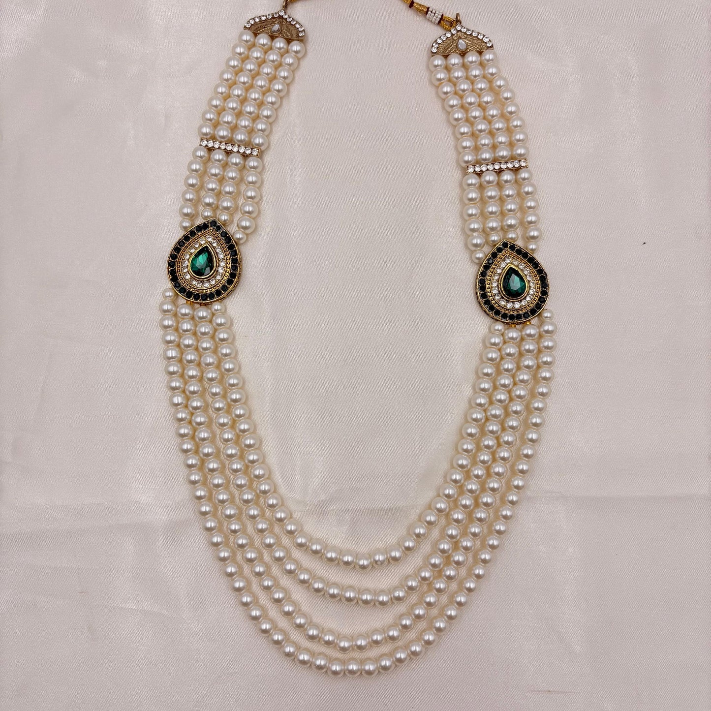 Multi-Layer White Pearl Necklace with Emerald Green Teardrop Stone Motifs