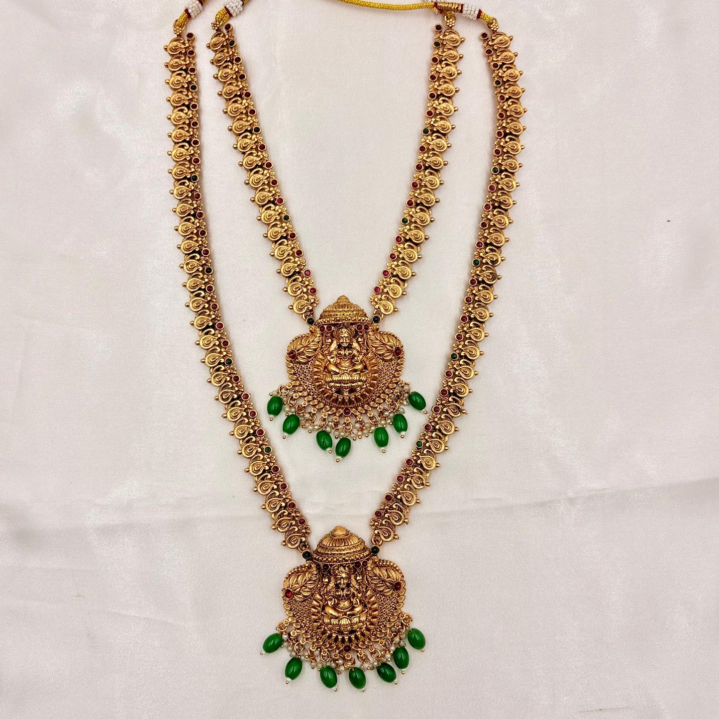 Antique Gold Dual Long Haram Necklace Set with Lakshmi Pendant & Green Beads
