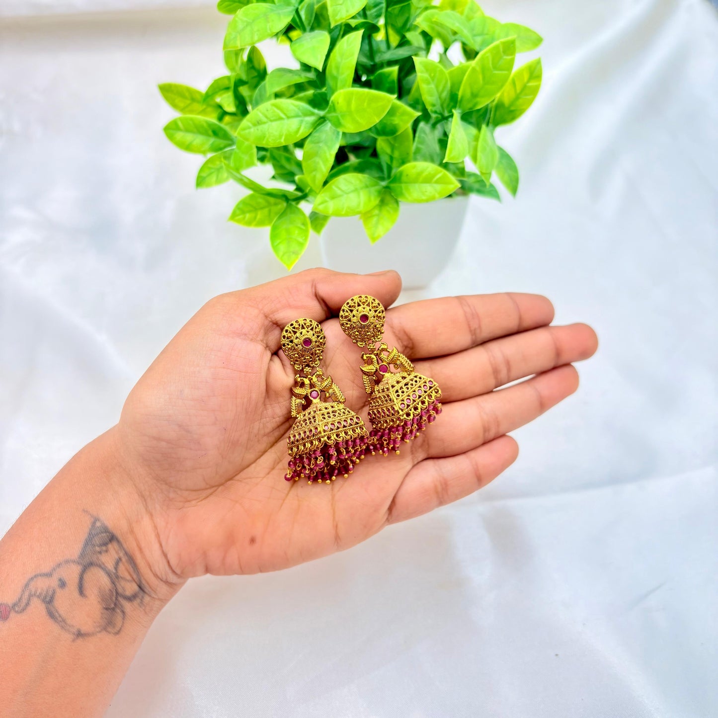 Antique Gold Temple Jhumka Earrings with Pink Stone Drops