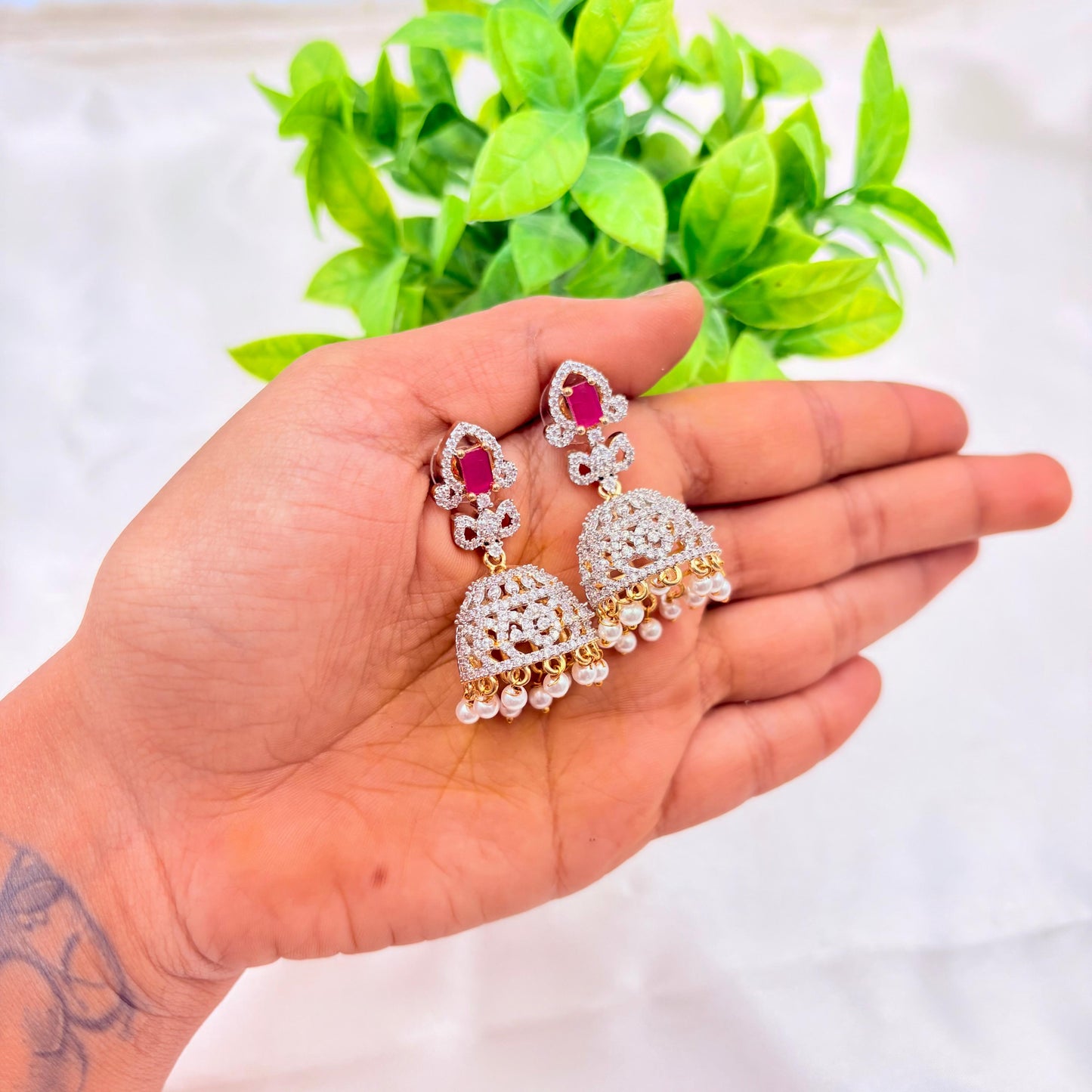 Pink Stone Diamond Finish Pearl Drop Jhumka Earrings