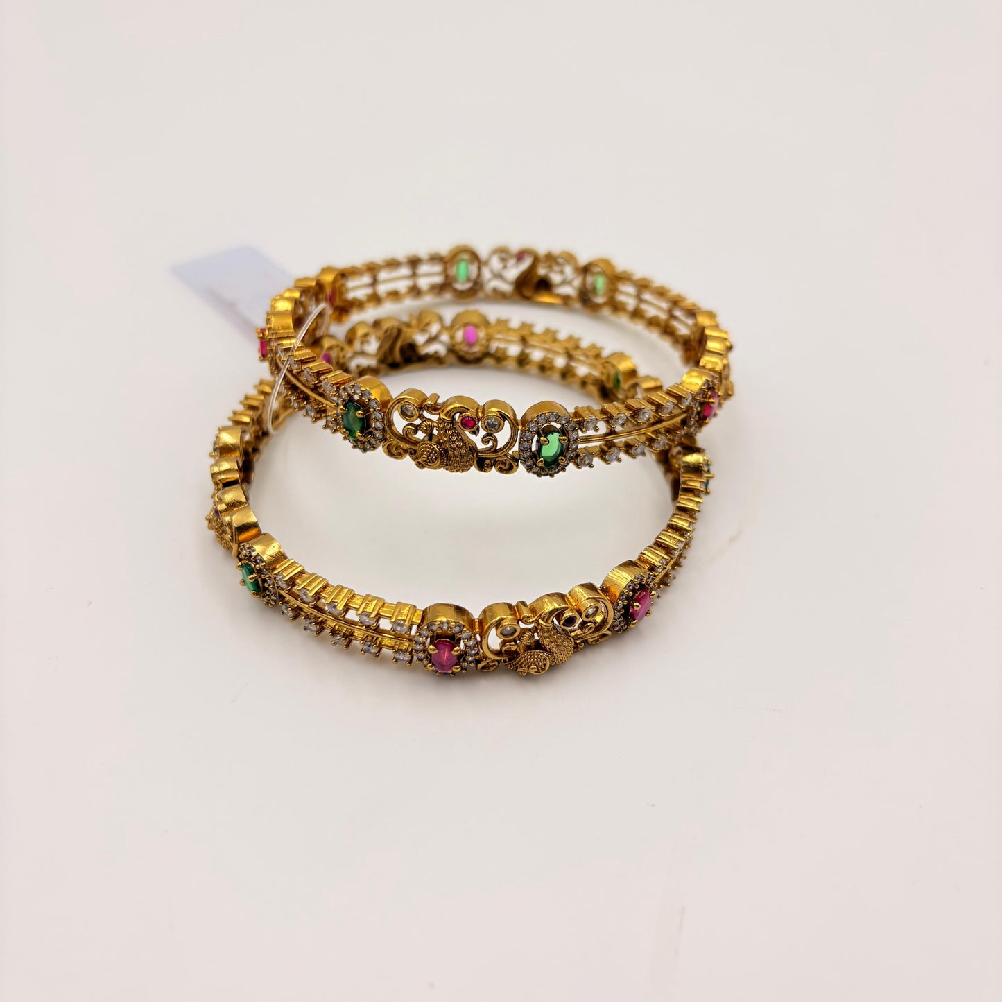 Gold-Plated Peacock Design Bangles with Ruby & Green Stones – Traditional Bridal Bangles