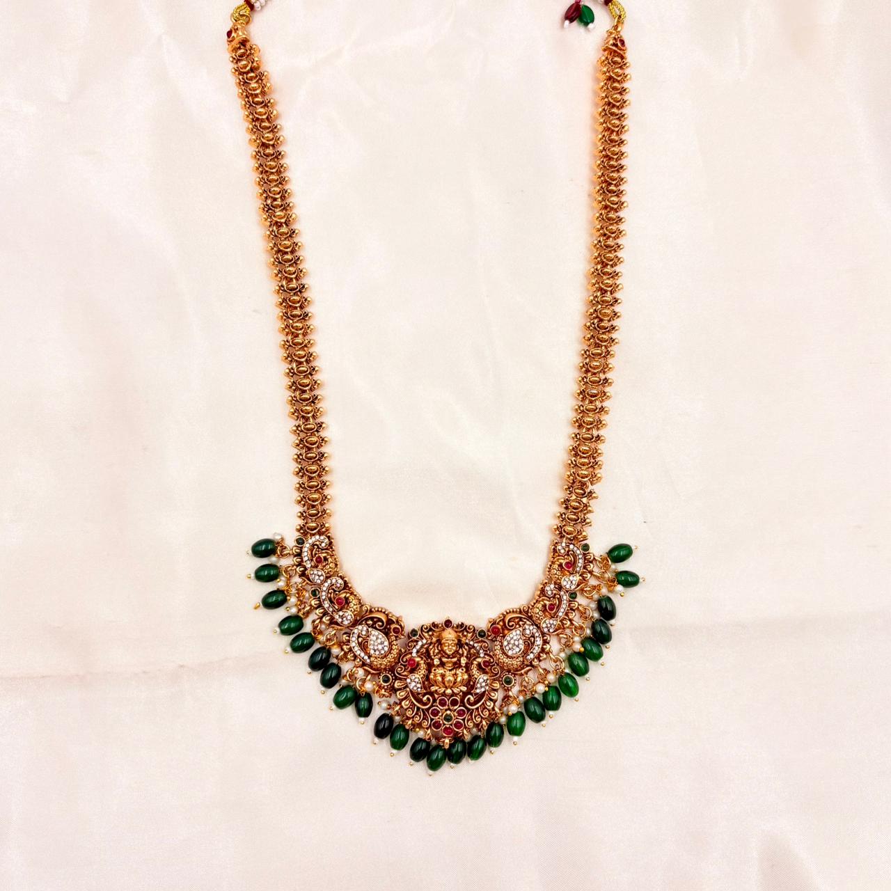 Gold Finish Lakshmi Temple Necklace Set with Green Beads