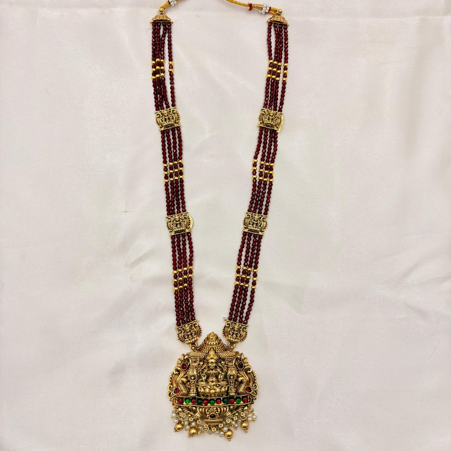 Red Beads Temple Haaram with Lakshmi Pendant & Jhumka Earrings | Antique Gold Finish