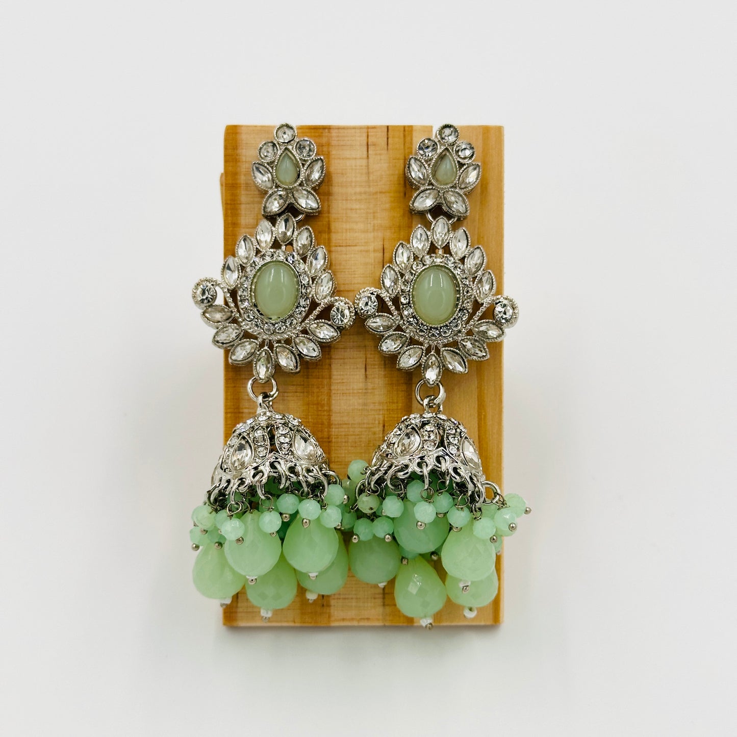 Silver-Plated Green Stone Kundan Choker Necklace Set with Jhumka Earrings & Maang Tikka