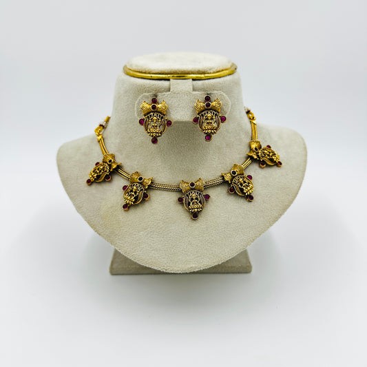 Antique Gold-Plated Lakshmi Devi Choker Necklace Set with Ruby Stones & Earrings