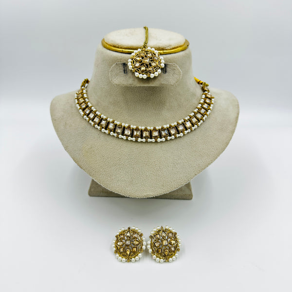 Pearl-Studded Kundan Necklace Set with Earrings & Maang Tikka