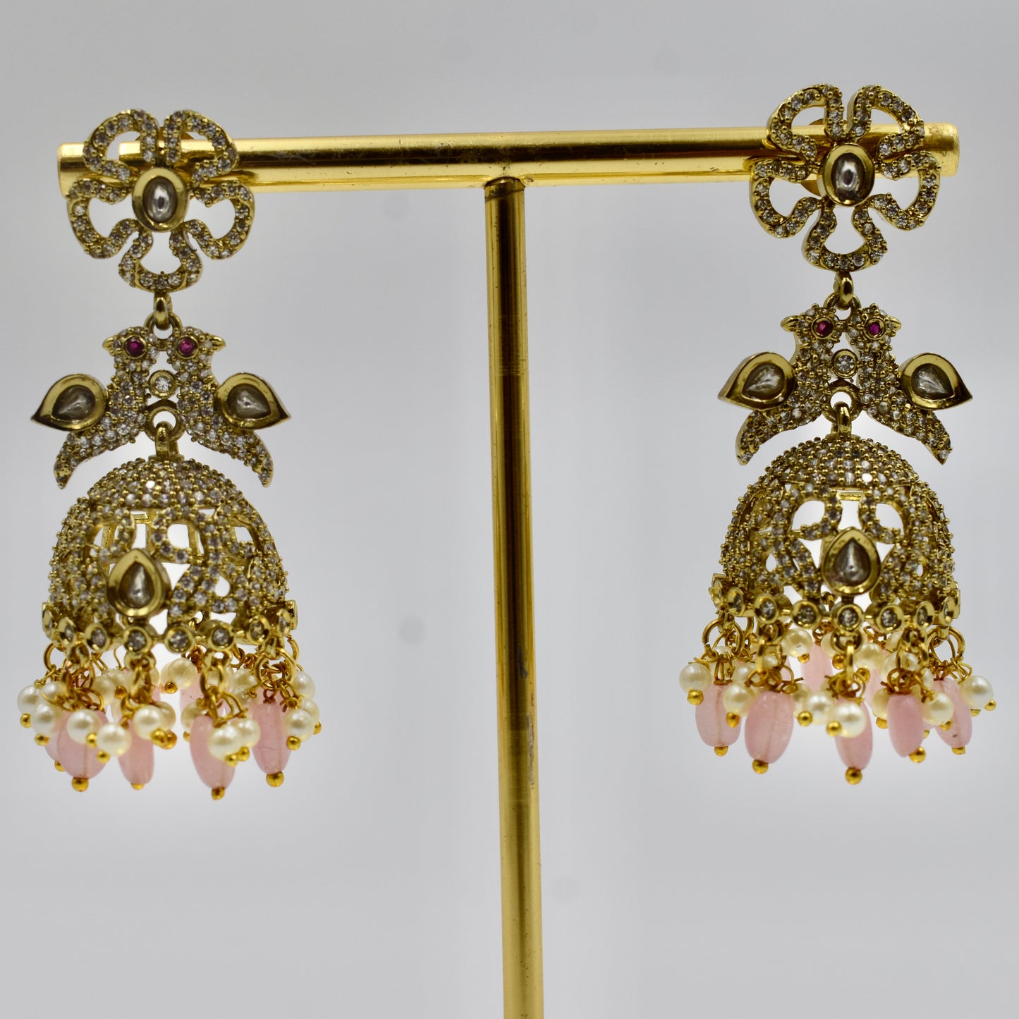 Gold-Plated Pink Beaded Kundan Jhumka Earrings with Pearls