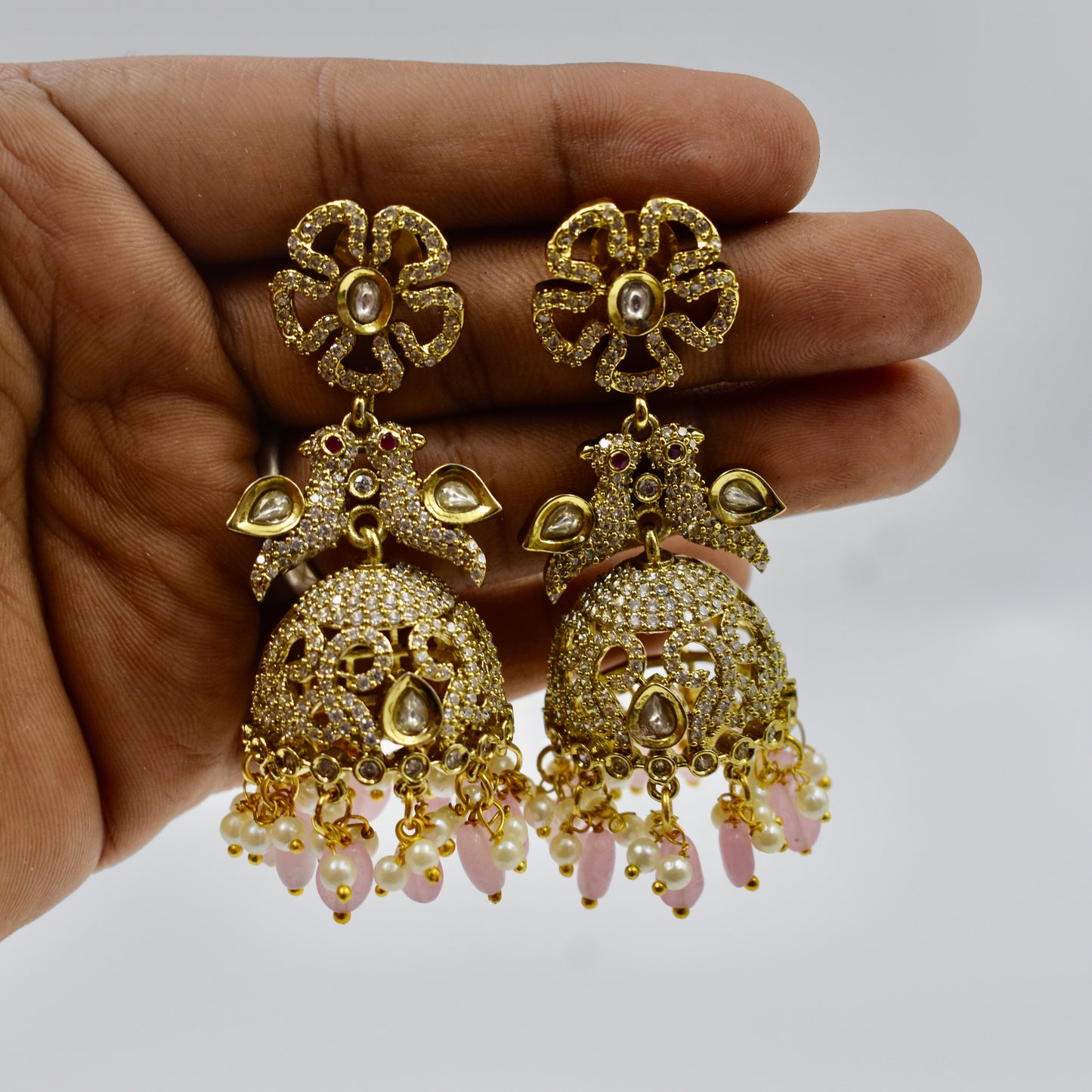 Gold-Plated Pink Beaded Kundan Jhumka Earrings with Pearls