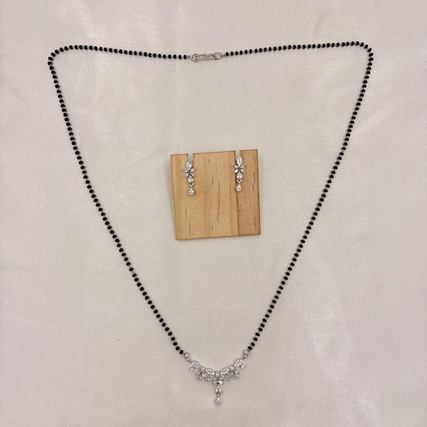 Silver Finish CZ Leaf Drop Mangalsutra with Matching Earrings