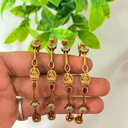 Temple Lakshmi Gold-Plated Bangles with Ruby & Green Stones – Traditional Bridal Wear (Set of 4)
