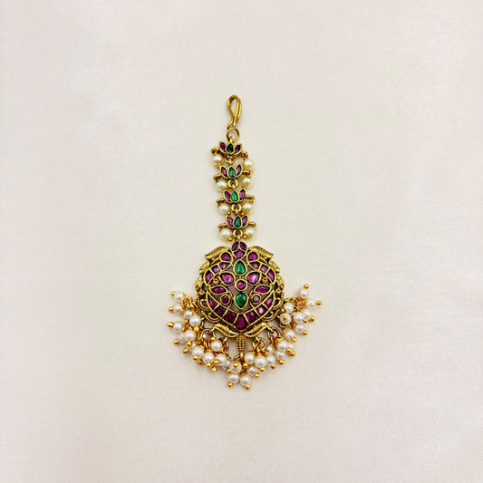 Traditional Temple Peacock Maang Tikka with Kemp Stones & Pearl Drops – Antique Gold Finish