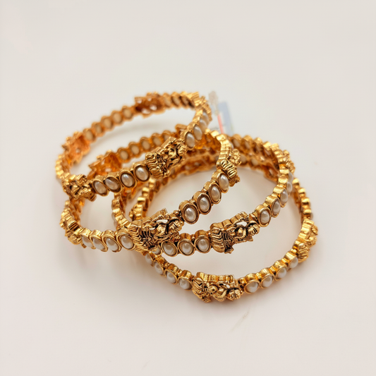 Antique Gold Temple Bangles with Pearls & Lakshmi Motifs – Traditional Bridal Bangle Set (Set of 4)