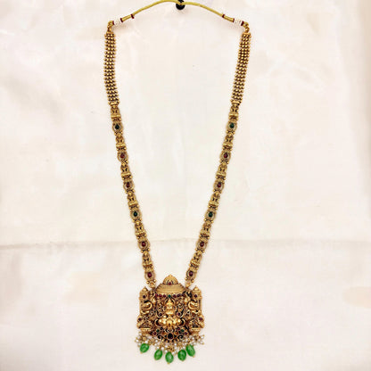 Antique Gold Finish Lakshmi Temple Necklace with Green Bead Drops & Matching Jhumka Earrings