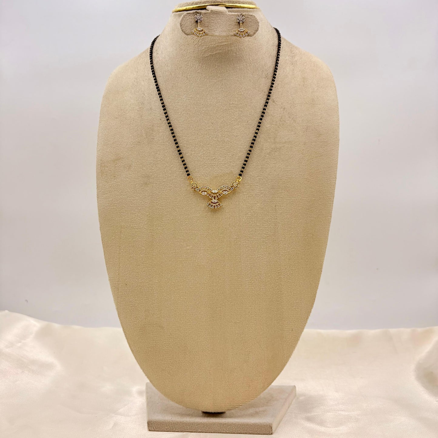 Gold Finish Layered CZ Mangalsutra with Matching Drop Earrings