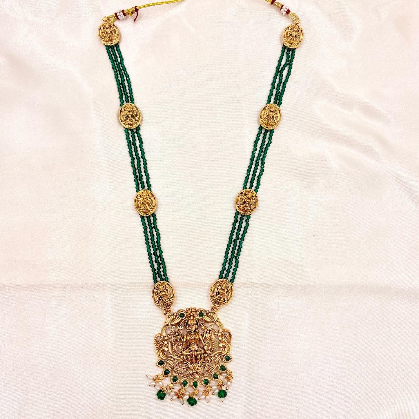 Antique Gold Finish Lakshmi Temple Long Necklace with Green Beads & Jhumka Earrings