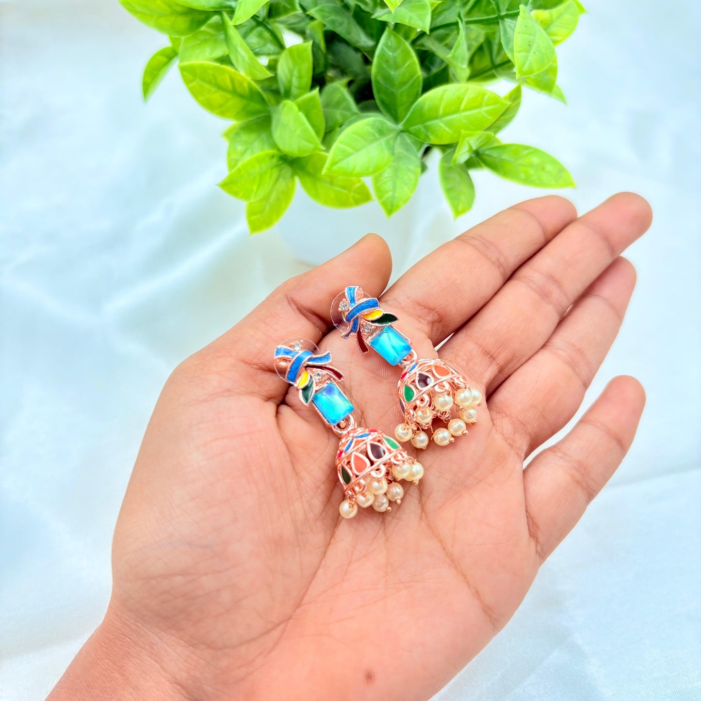 Rose Gold Enamel Jhumka Earrings with Blue Stone & Pearl Drops