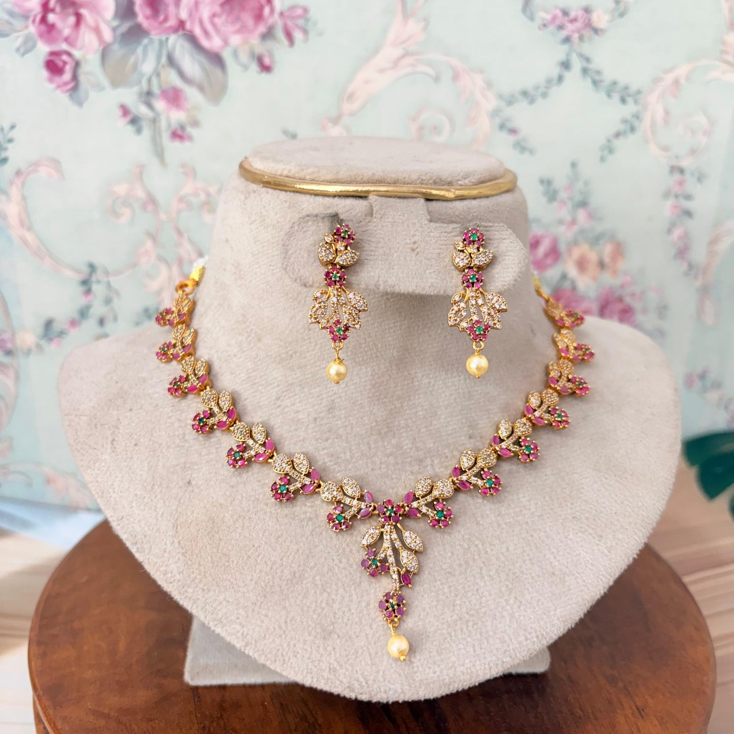 Floral AD Stone Gold Finish Necklace Set with Pink & Green Stones and Pearl Drops