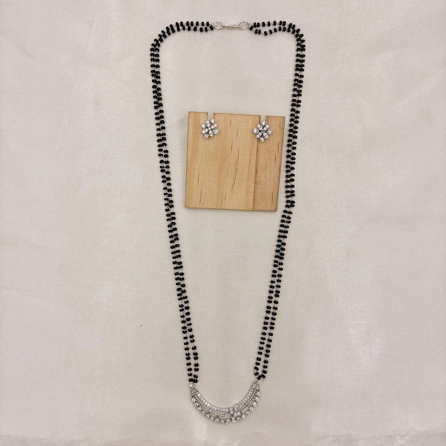 Elegant CZ Curve Bar Mangalsutra with Matching Stud Earrings