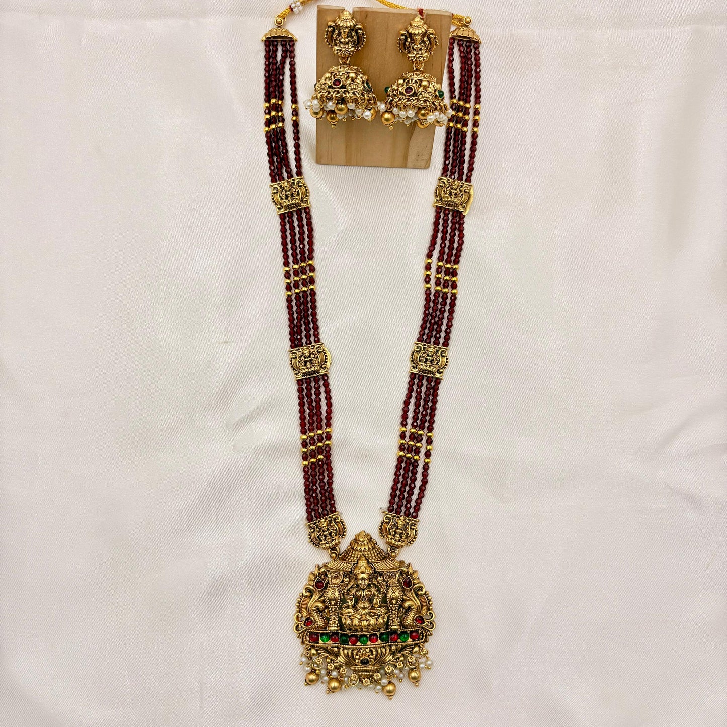 Red Beads Temple Haaram with Lakshmi Pendant & Jhumka Earrings | Antique Gold Finish