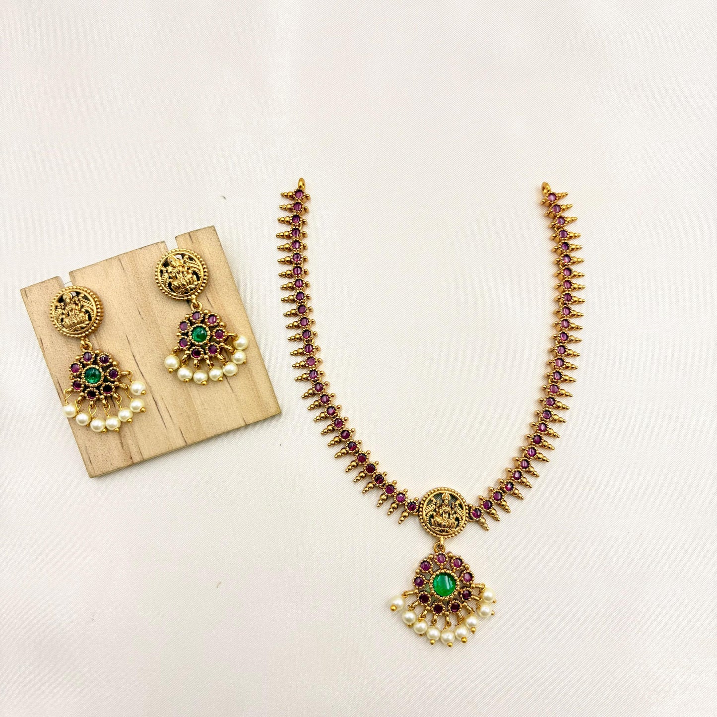 Lakshmi Temple Necklace Set with Ruby Stones & Pearl Drops – Gold Finish