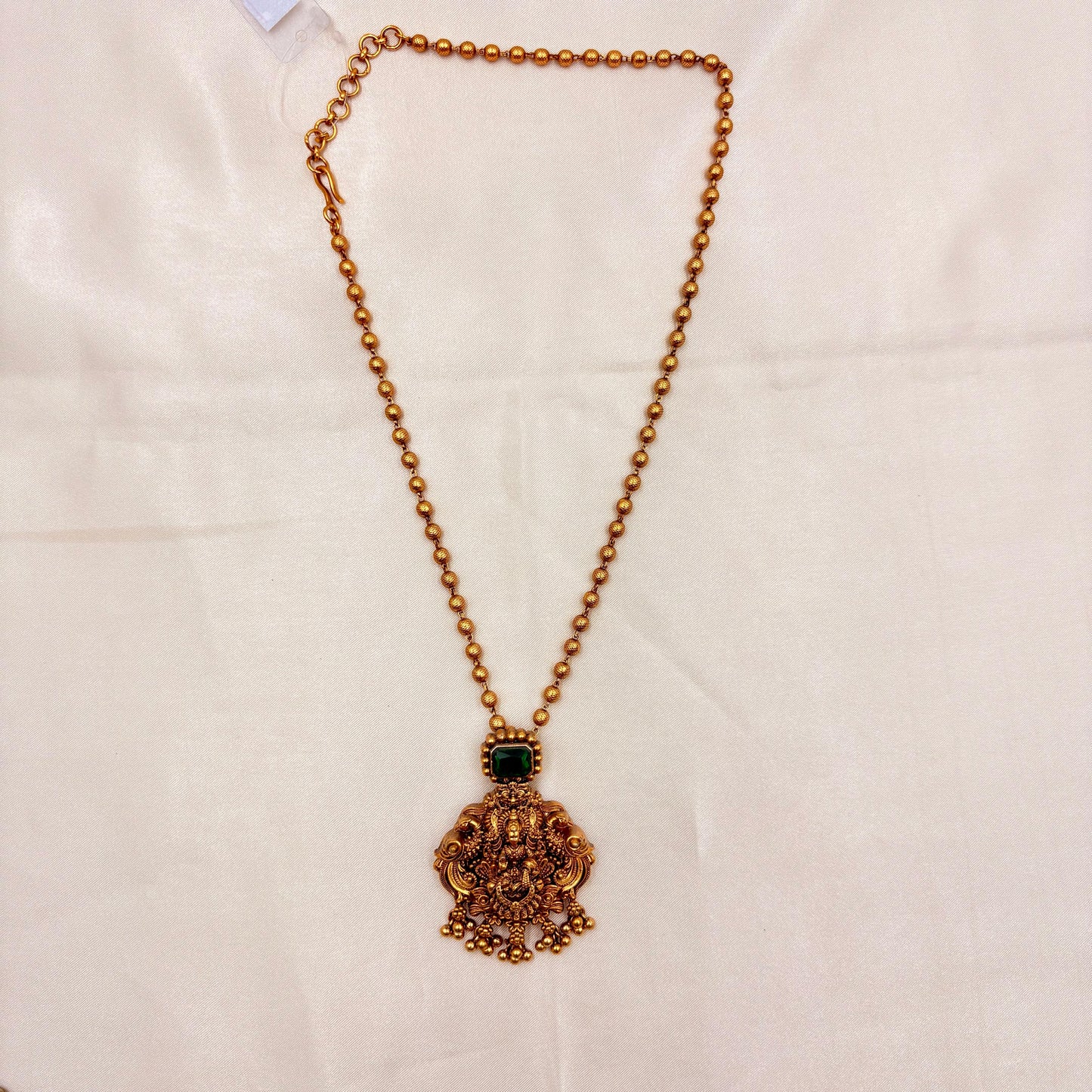 Gold Finish Temple Necklace Set with Green Stone Pendant & Earrings