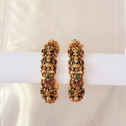 Antique Gold Lakshmi Temple Bangles with Ruby & Green Stones – Heavy Bridal Bangles