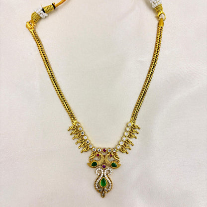 Antique Gold Finish Necklace Set with Green & Pink Stones
