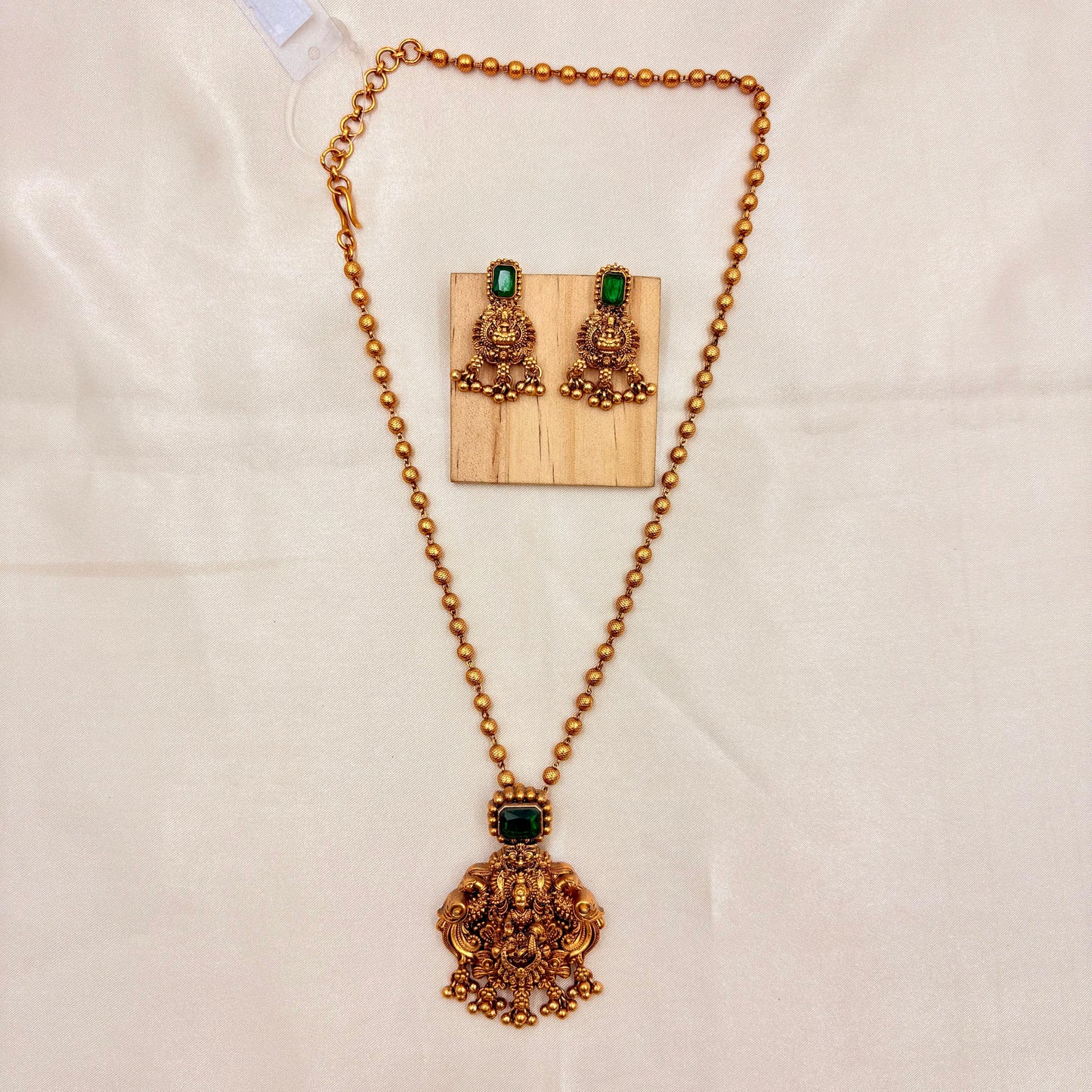 Gold Finish Temple Necklace Set with Green Stone Pendant & Earrings