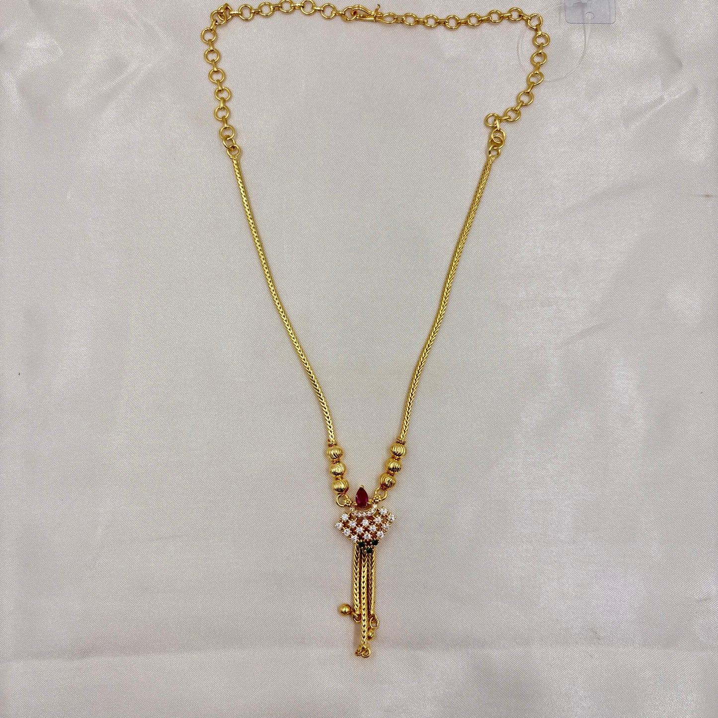 Gold-Plated American Diamond Tassel Pendant Necklace