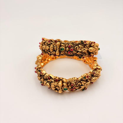 Antique Gold Lakshmi Temple Bangles with Ruby & Green Stones – Heavy Bridal Bangles