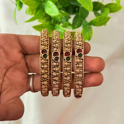 Antique Gold-Plated Temple Bangles with Ruby & Green Stones – Slim Traditional Design (Set of 2)