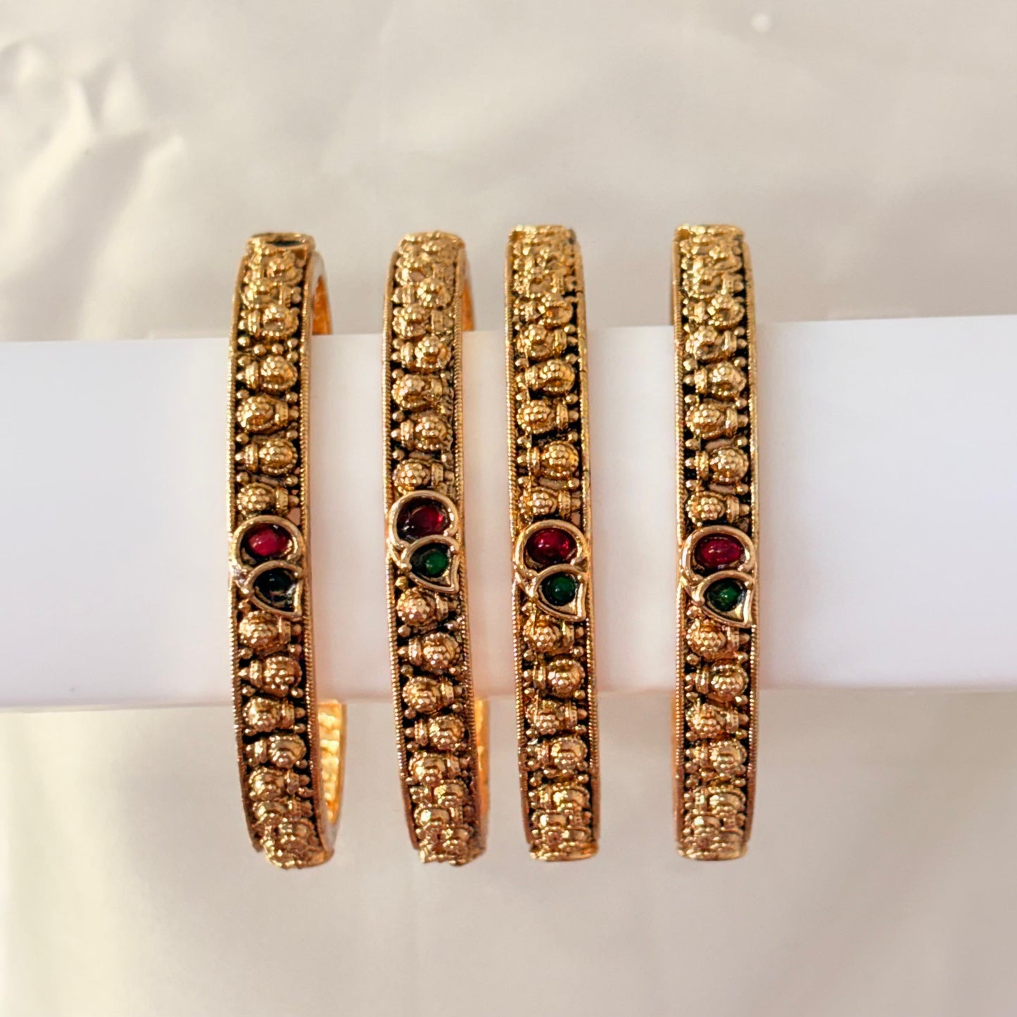 Antique Gold-Plated Temple Bangles with Ruby & Green Stones – Slim Traditional Design (Set of 2)