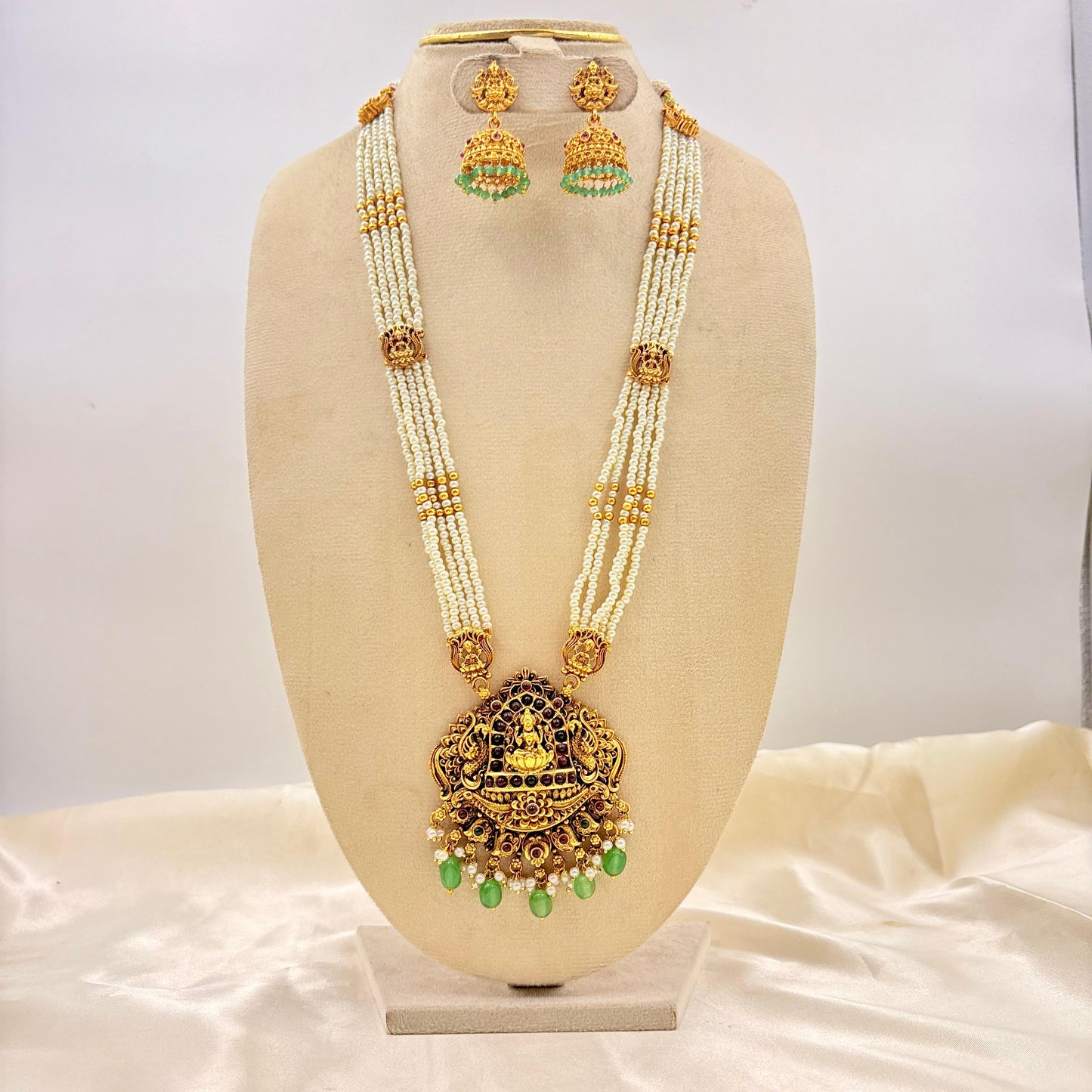 Antique Gold Finish Lakshmi Temple Long Pearl Necklace with Green Drop Jhumka Earrings