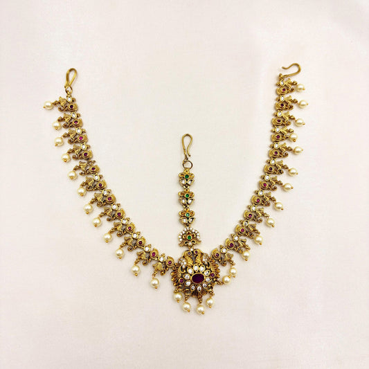 Traditional Lakshmi Bridal Vaddanam with Ruby Stones & Pearl Drops – Antique Gold Finish