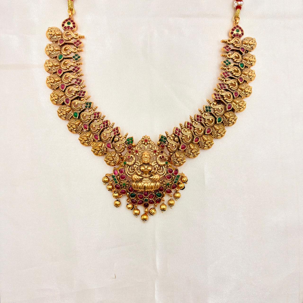 Traditional Lakshmi Temple Necklace with Ruby & Green Stones – Gold Finish
