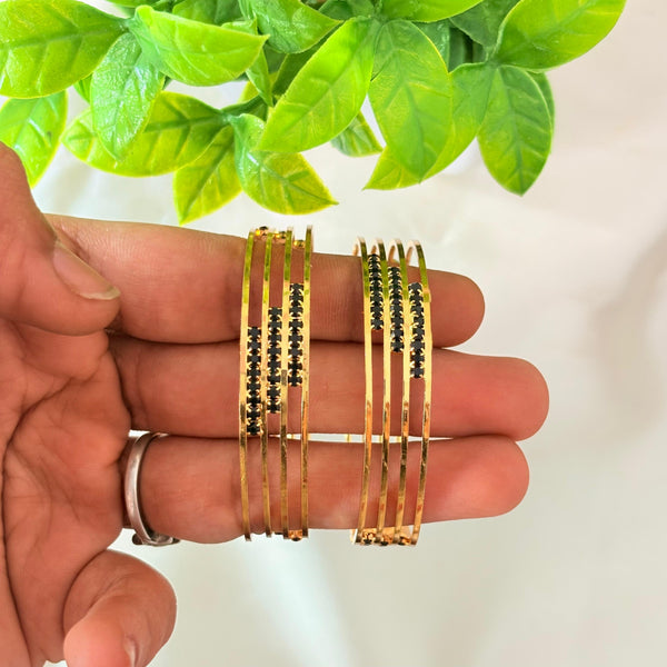 Gold Finish Sleek Bangles with Black Stone Detailing | Minimal Traditional Style