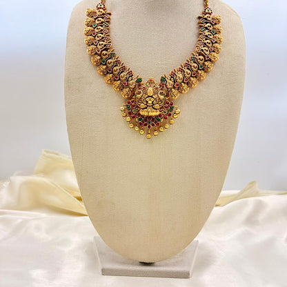 Traditional Lakshmi Temple Necklace with Ruby & Green Stones – Gold Finish