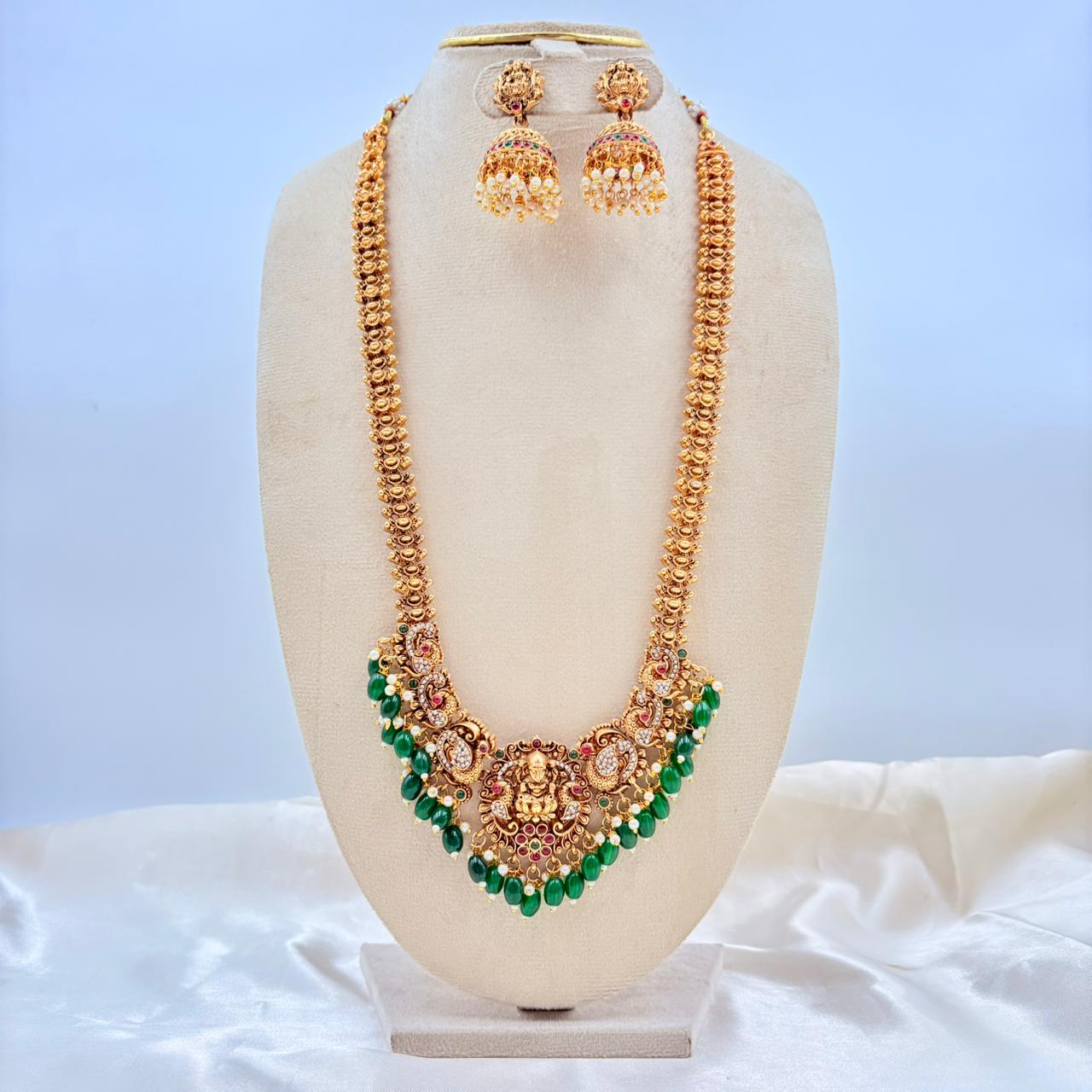 Gold Finish Lakshmi Temple Necklace Set with Green Beads