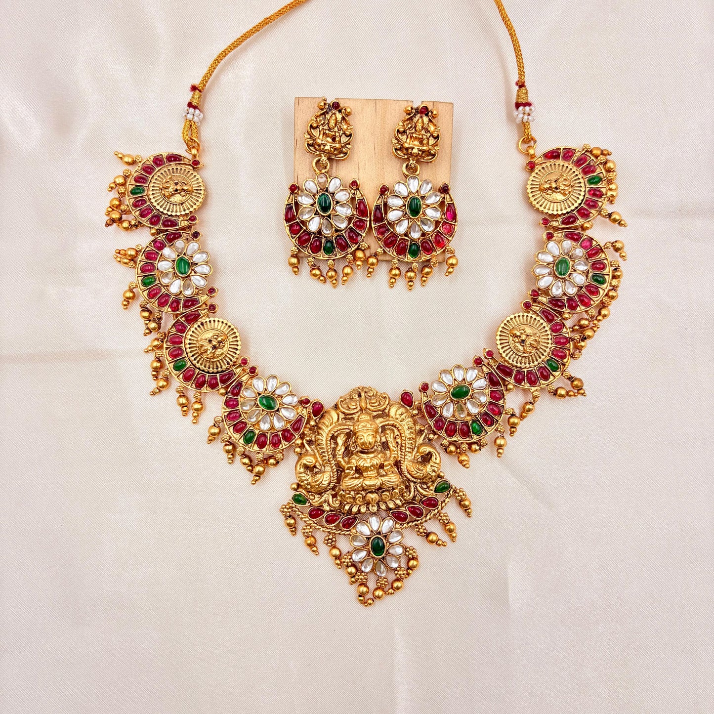 Gold Plated Lakshmi Temple Necklace Set with Ruby, Green Stones & Matching Earrings
