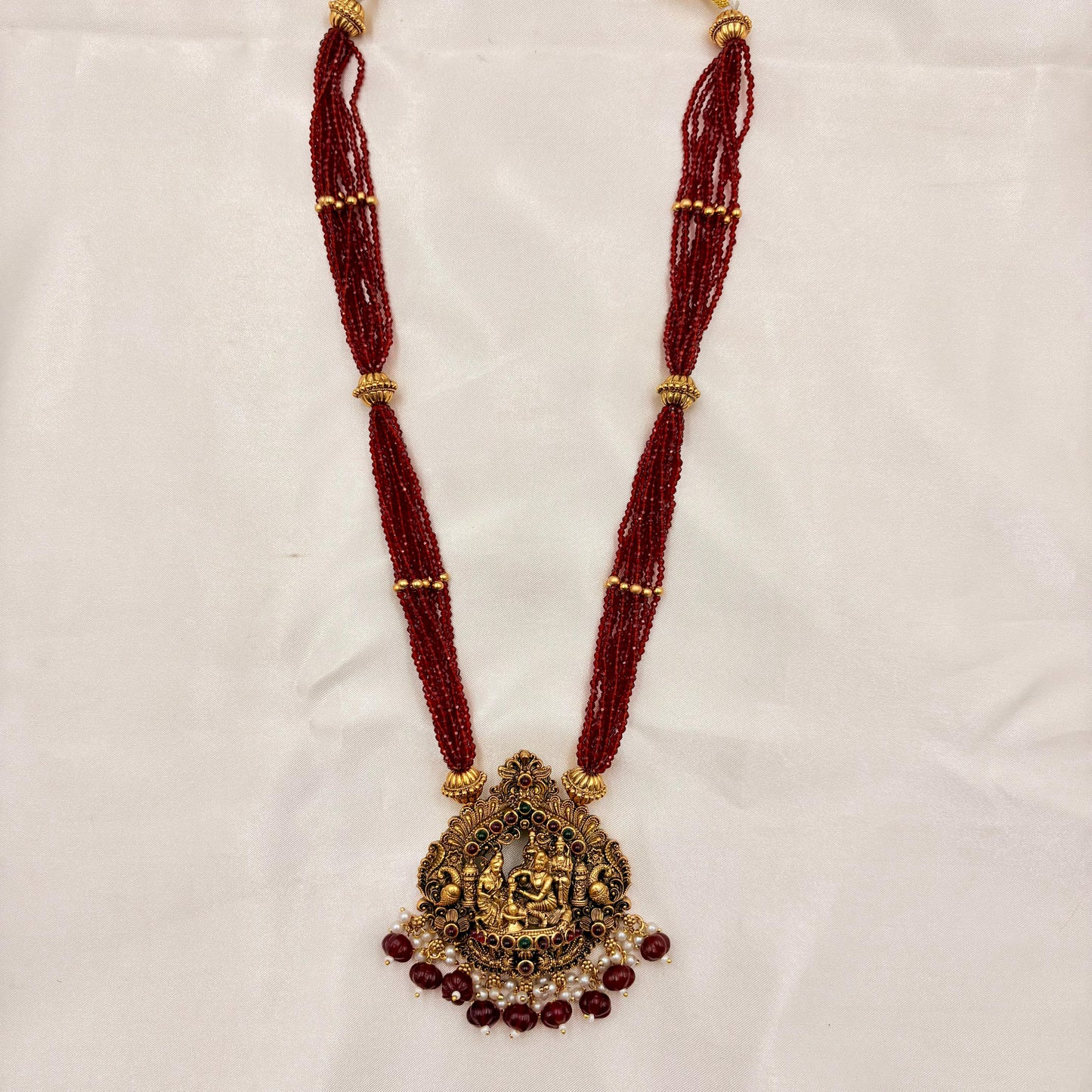 Temple Jewellery Red Beads Lakshmi Pendant Necklace Set with Jhumka Earrings | Antique Gold Finish