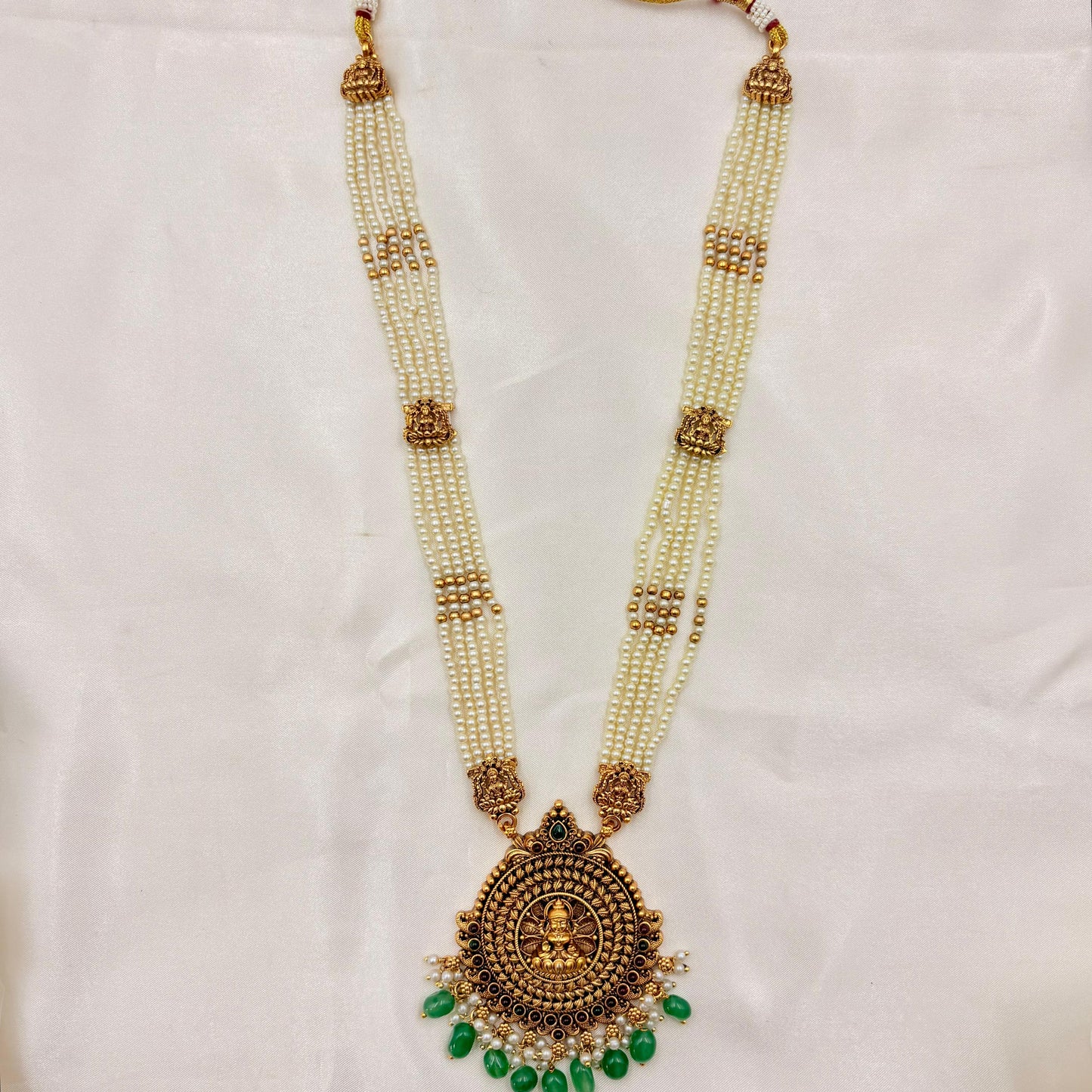 Traditional Pearl Temple Haaram with Lakshmi Pendant & Jhumka Earrings | Antique Gold | Green Drops