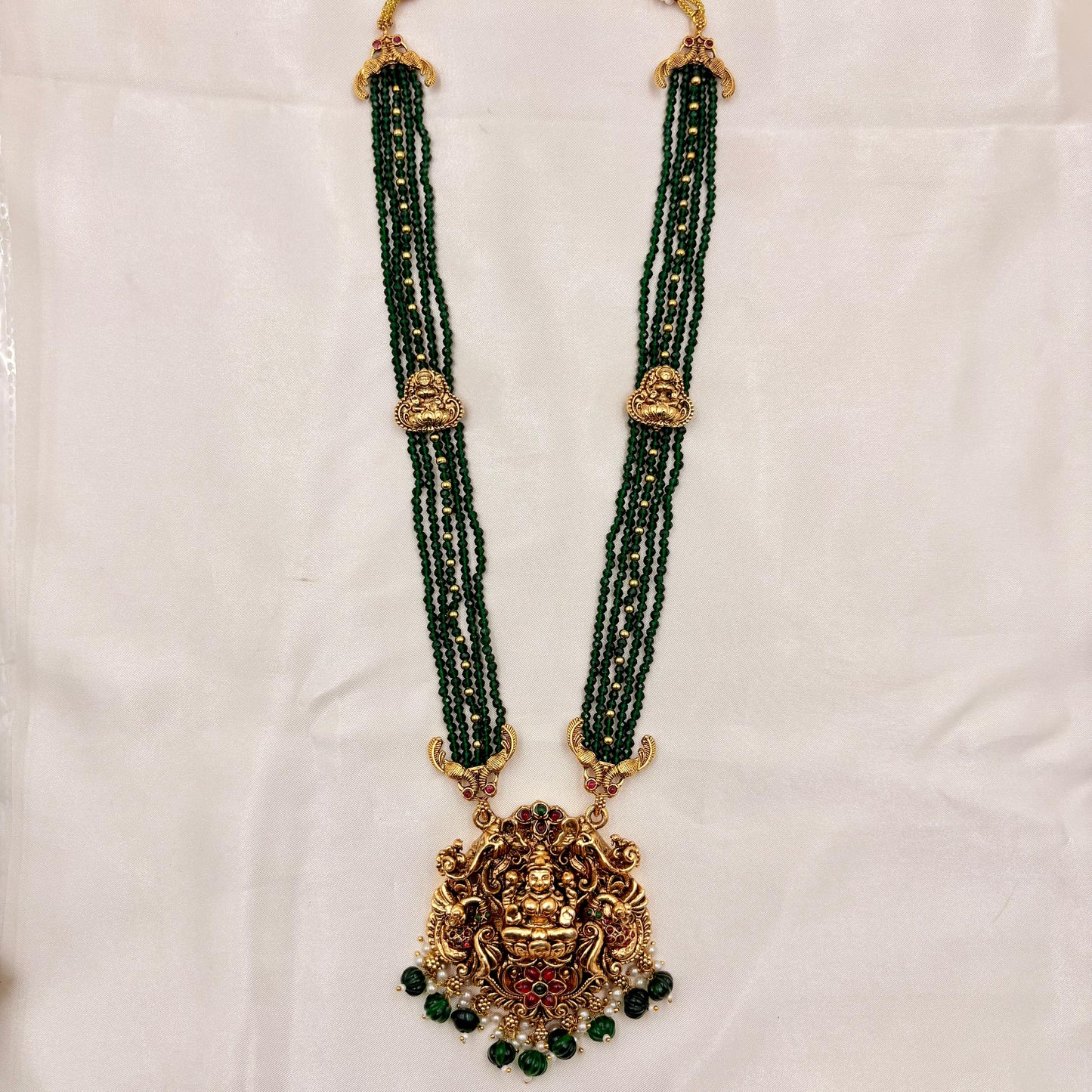 Temple Jewellery Lakshmi Pendant Green Beads Necklace Set with Jhumka Earrings | Antique Gold Finish