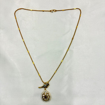 Antique Gold Kundan Pendant Necklace Set with Matching Earrings